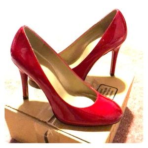Stuart Weitzman round toe red heels
